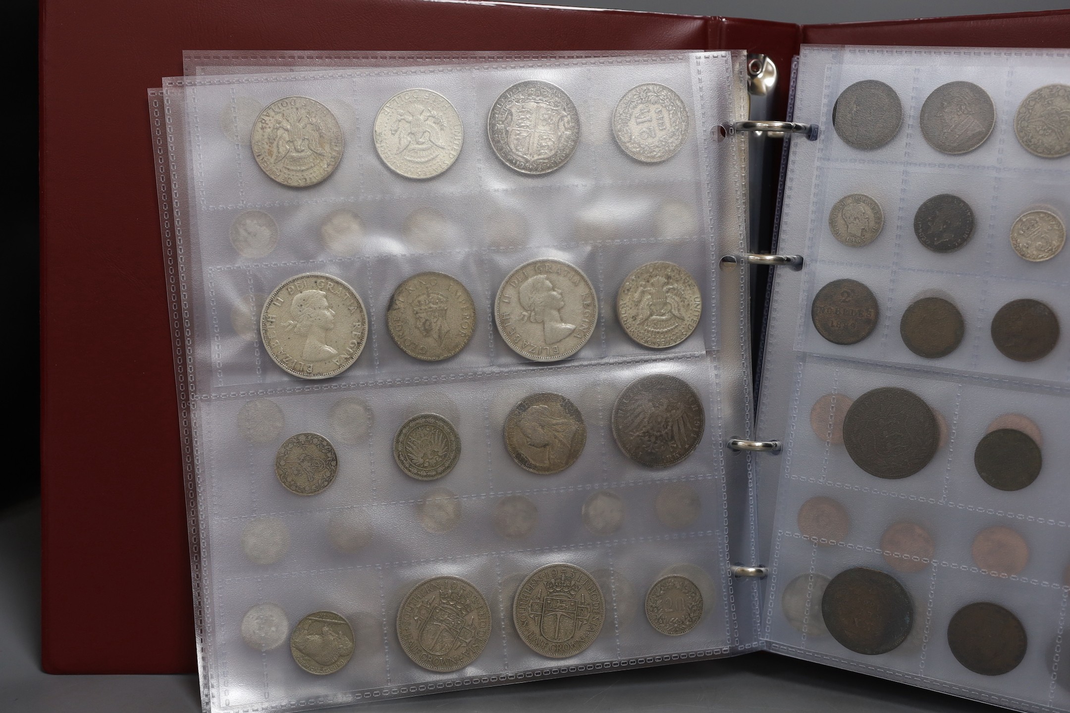 An album of British, Commonwealth and world coins including